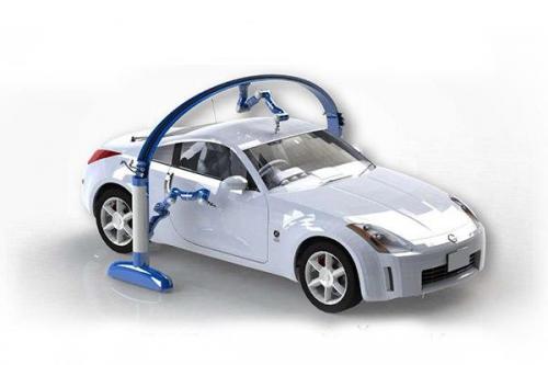 Учёные создали первого в мире робота - автомойщика.