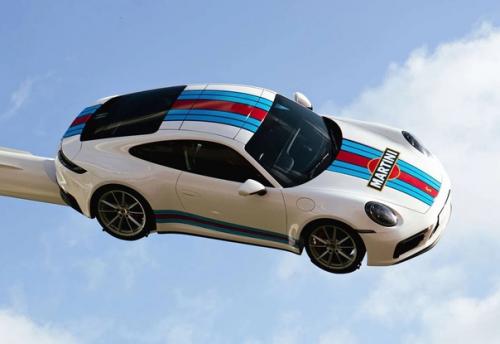 B честь 75-летия Porsche создал фантастическую скульптуру, посвященную его авто. 04