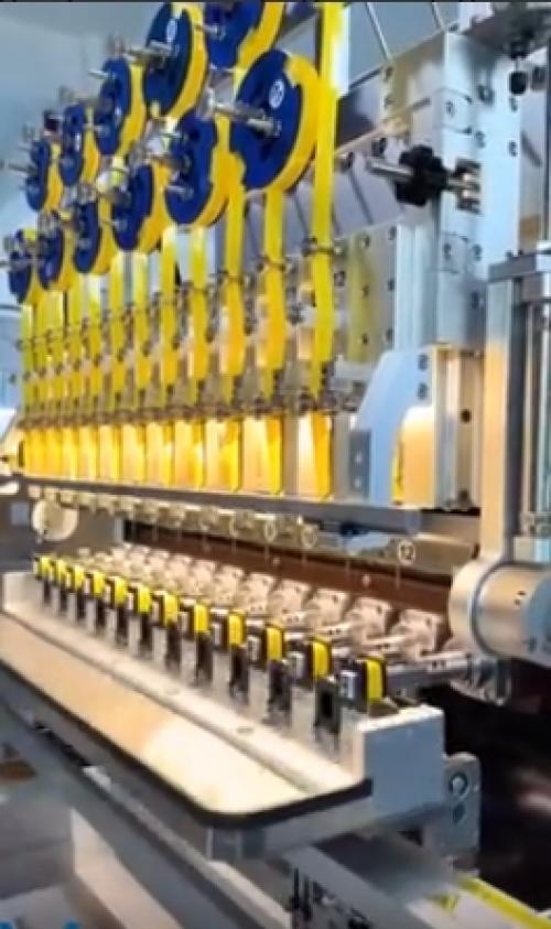 Vacuz - автоматизированный намоточно - ленточный аппарат с 12 шпинделями для изготовления катушек трансформаторов.  